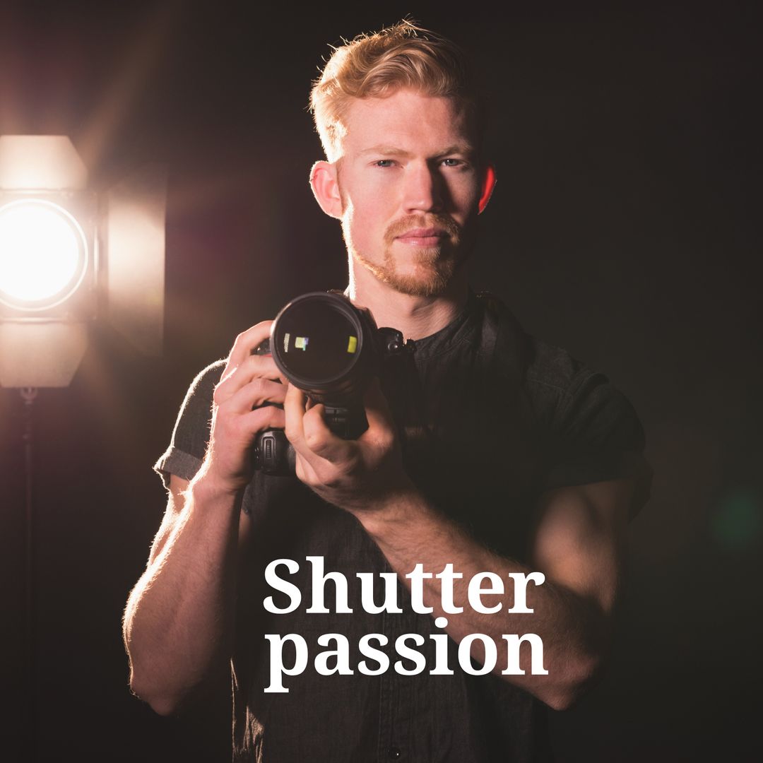 Photographer Holding Camera in Studio Lighting