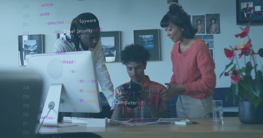 Diverse Professionals Analyzing Digital Data in Modern Office