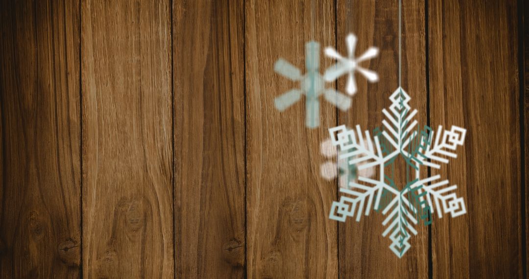 Festive Snowflakes on Wooden Background for Christmas Celebrations - Free Images, Stock Photos and Pictures on Pikwizard.com