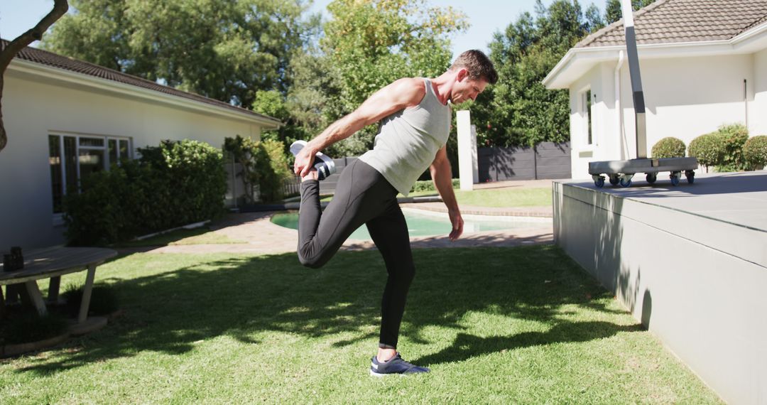 Man Stretching Leg Outdoors in Backyard Before Exercise - Free Images, Stock Photos and Pictures on Pikwizard.com