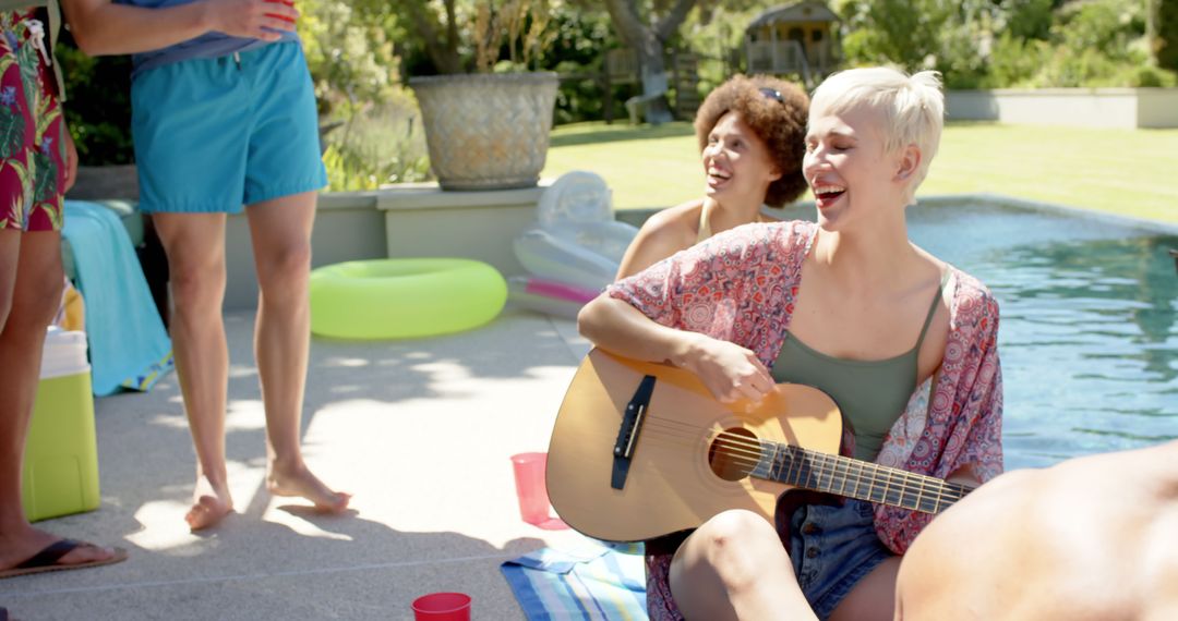 Friends Enjoying Poolside with Guitar During Summer - Free Images, Stock Photos and Pictures on Pikwizard.com