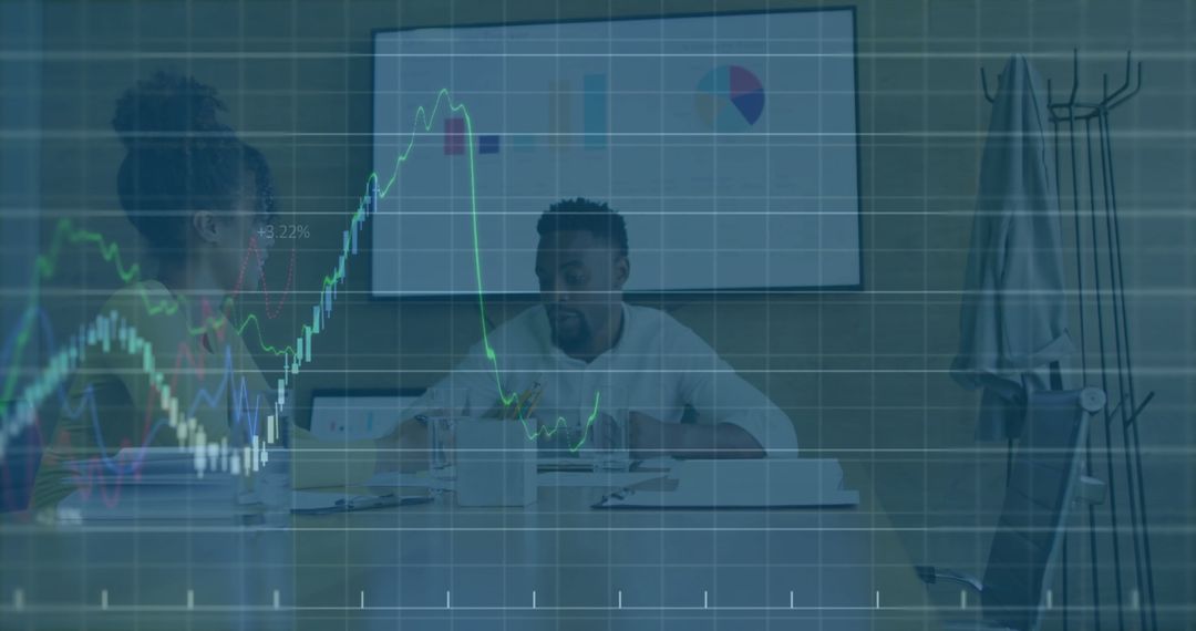 Colleagues Analyzing Data with Digital Interface Overlay