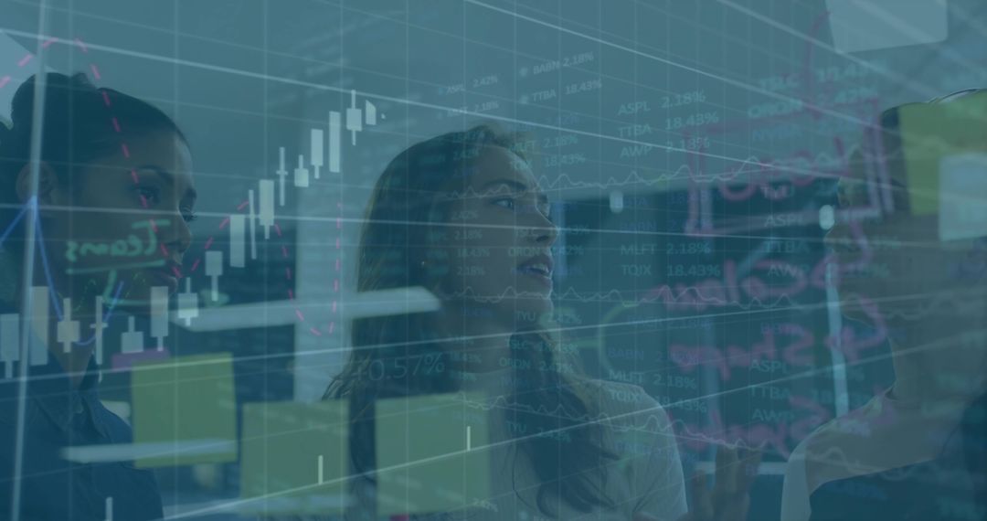 Three analysts collaborating over glass wall of candlestick charts and sticky notes