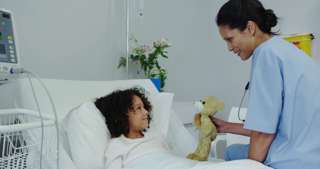 Nurse Comforting Hospitalized Child with Teddy Bear - Free Images, Stock Photos and Pictures on Pikwizard.com