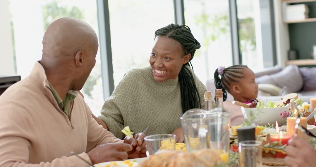 African American Family Enjoying Thanksgiving Meal Together - Free Images, Stock Photos and Pictures on Pikwizard.com