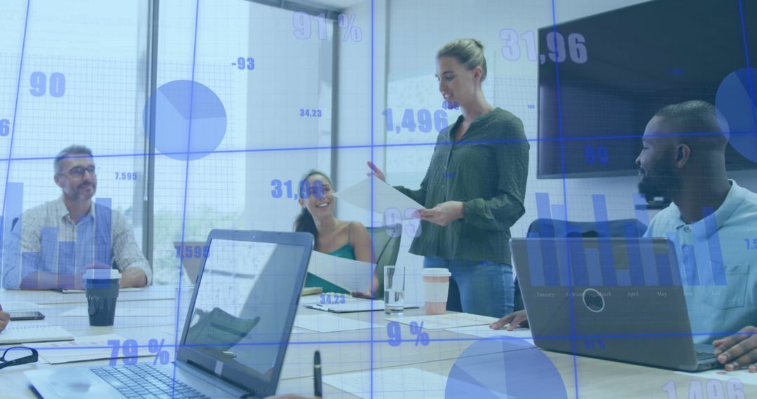 Colleagues Analyzing Business Data during Team Meeting