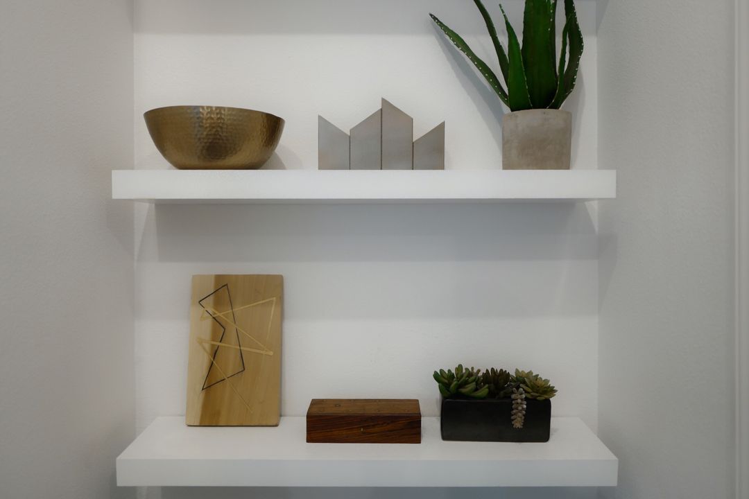 Minimalist Shelves with Decorative Wooden and Ceramic Items - Free Images, Stock Photos and Pictures on Pikwizard.com
