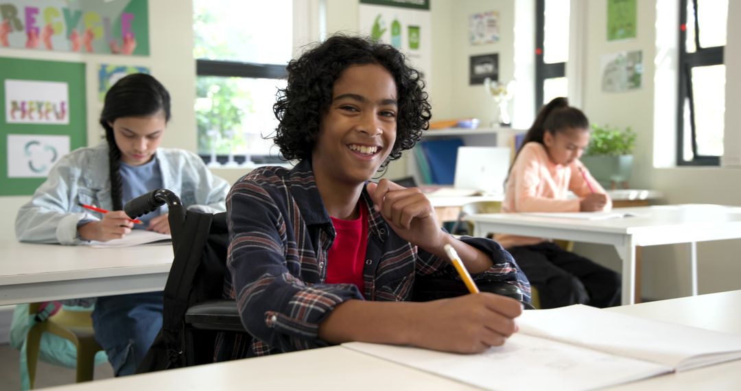 Smiling Student in Wheelchair Studying with Classmates in Vibrant Classroom
