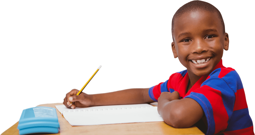 African American Boy Smiling at Desk with Pencil on Transparent Background