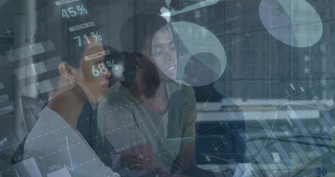 Women Collaborating on Modern Data Visualization Interfaces