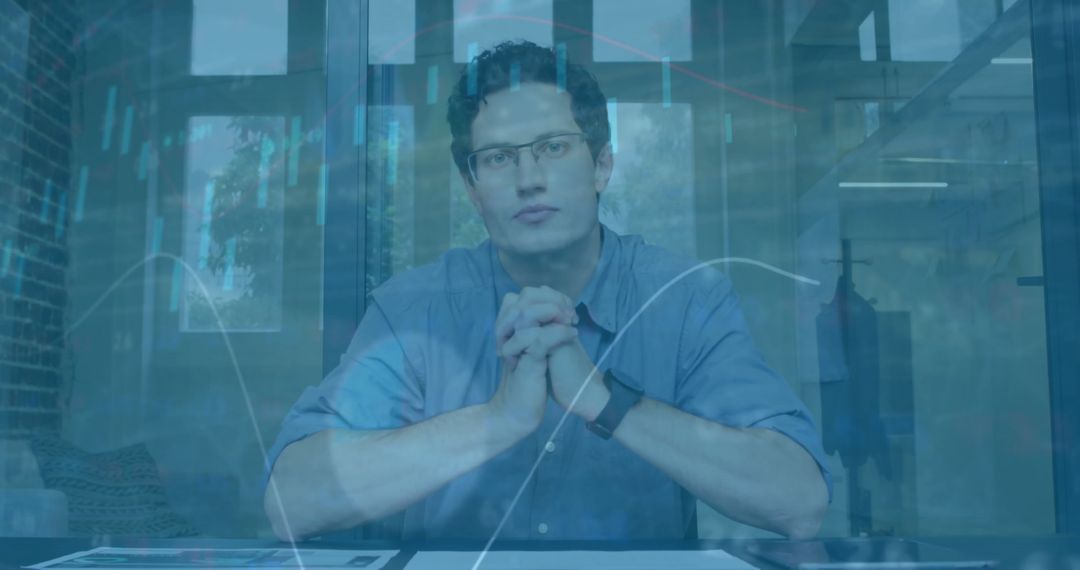 Businessman Analyzing Financial Data Insights in Modern Office