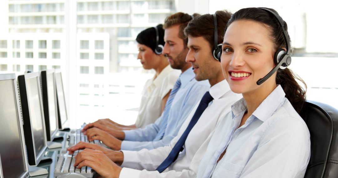 Professional Customer Support Team Working in Office - Free Images, Stock Photos and Pictures on Pikwizard.com