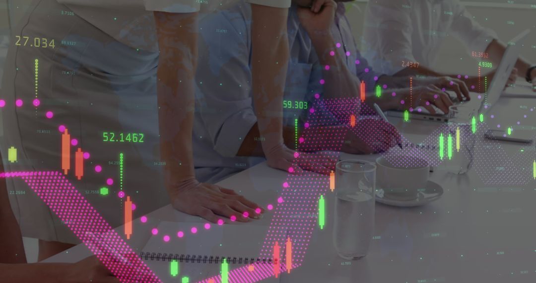 Business Team Analyzing Financial Data with Trends and Charts Overlay