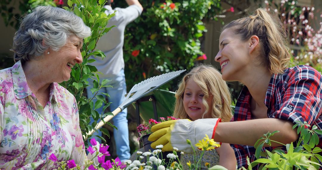 Grandmother, Mother, and Child Gardening Together in Blooming Garden - Free Images, Stock Photos and Pictures on Pikwizard.com