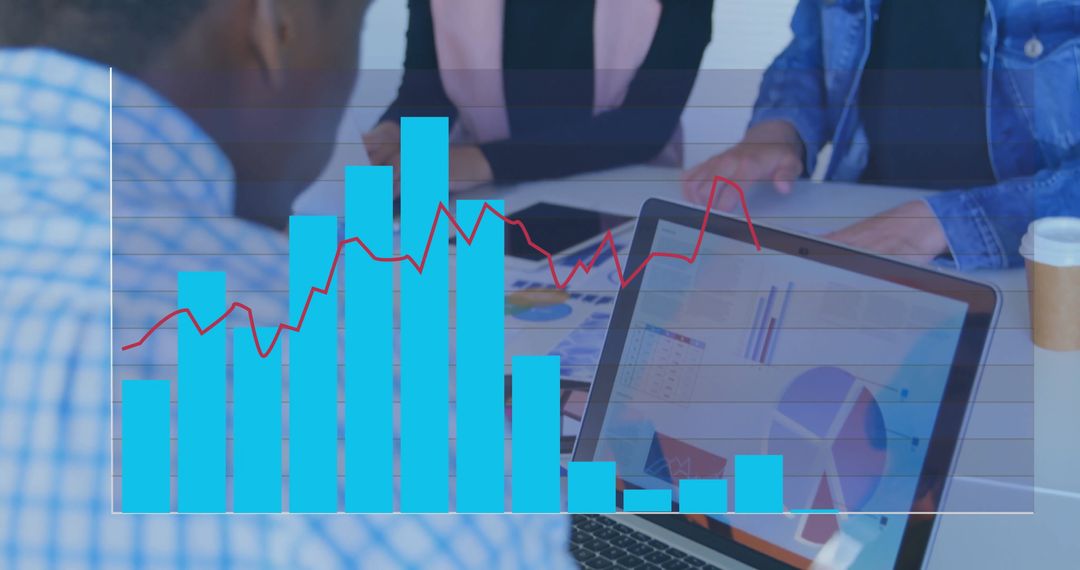 Business Colleagues Analyzing Charts for Data-Driven Strategy