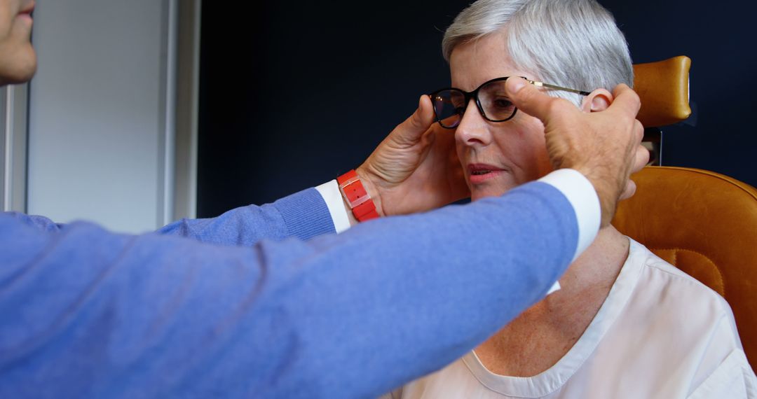 Optometrist Adjusting Prescription Glasses for Senior Woman - Free Images, Stock Photos and Pictures on Pikwizard.com