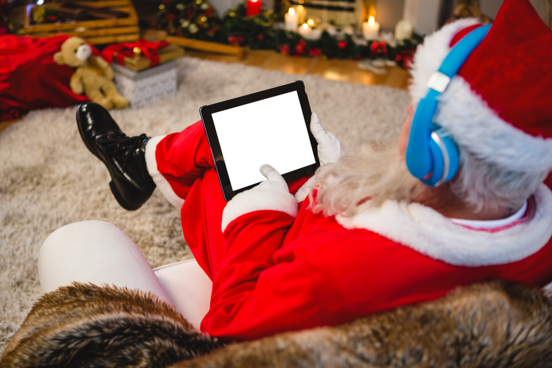 Santa Claus Using Digital Tablet Near Cozy, Transparent Holiday Theme - Download Free Stock Images Pikwizard.com