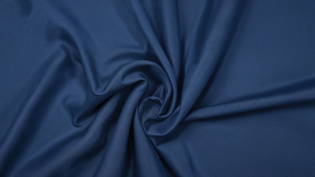 Swirled Blue Fabric with Smooth Folds and Subtle Sheen