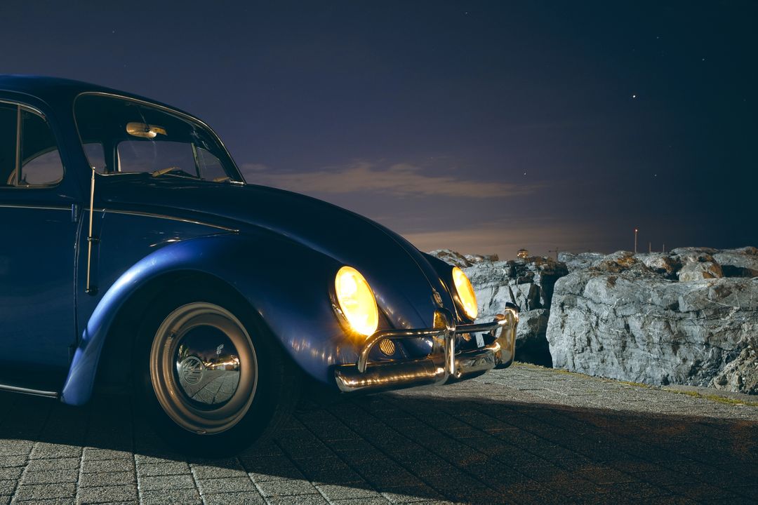 Blue Volkswagen Beetle Car Near Cliff during Night Time - Free Images, Stock Photos and Pictures on Pikwizard.com