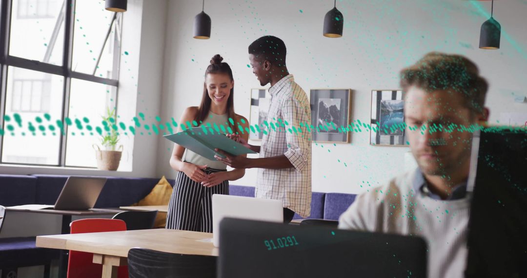 Diverse Team Collaborating with Digital Financial Data Icons in Modern Office