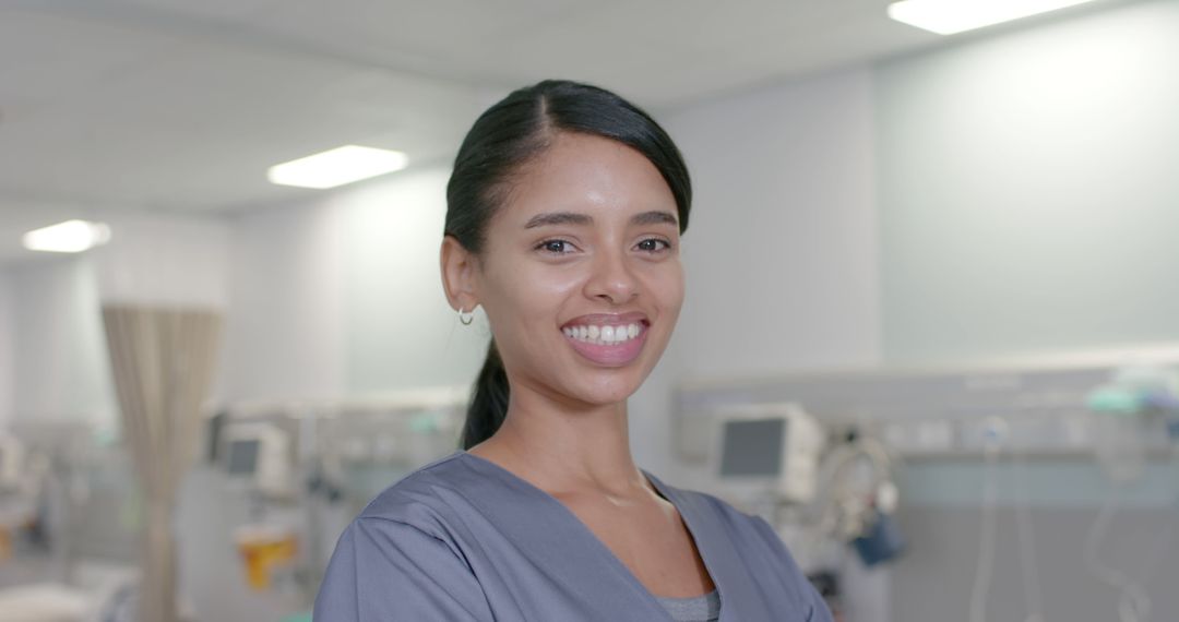 Smiling Nurse in Hospital Ward with Medical Equipment - Free Images, Stock Photos and Pictures on Pikwizard.com