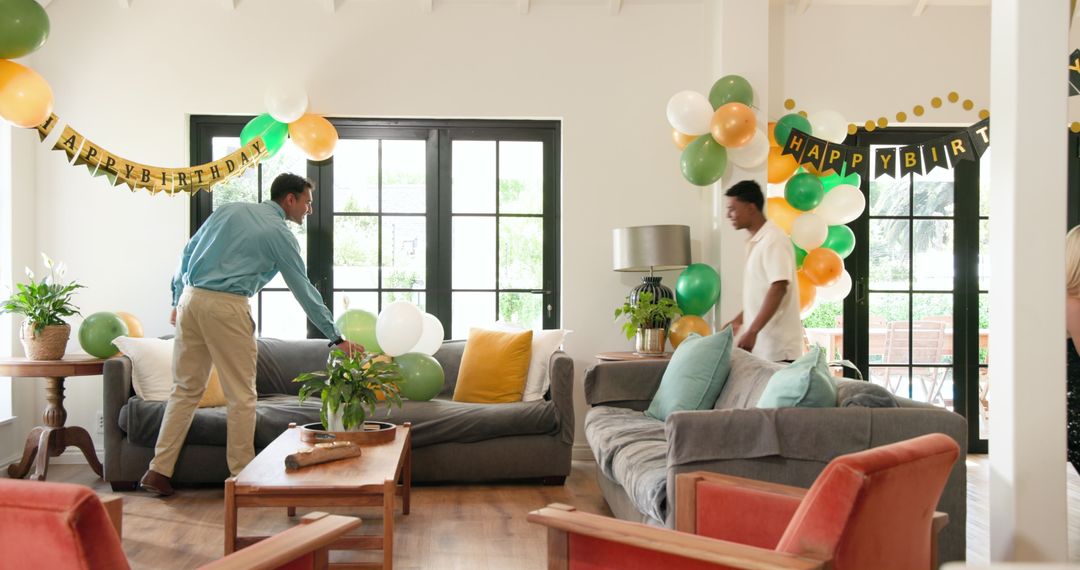 Friends Preparing Decorations for a Festive Birthday Party at Home