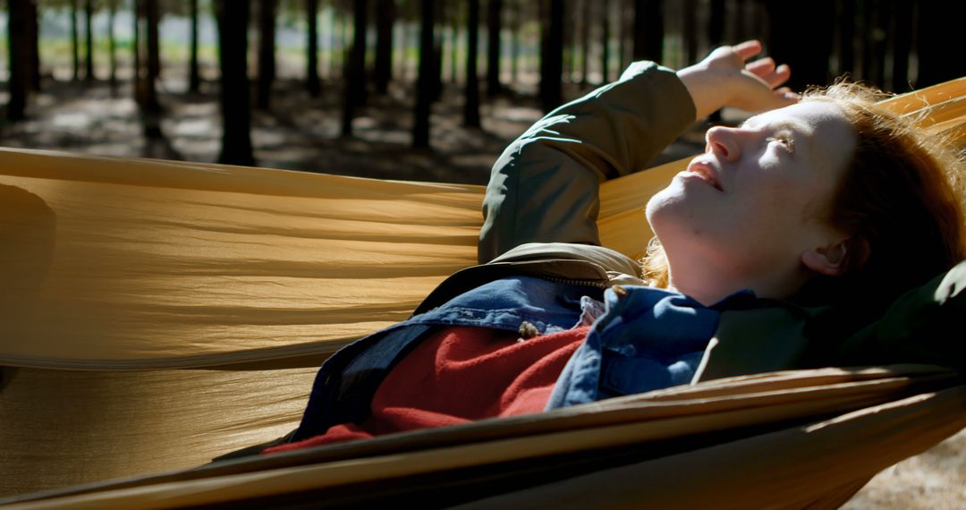 Woman Relaxing in Hammock in Forest at Golden Hour - Free Images, Stock Photos and Pictures on Pikwizard.com