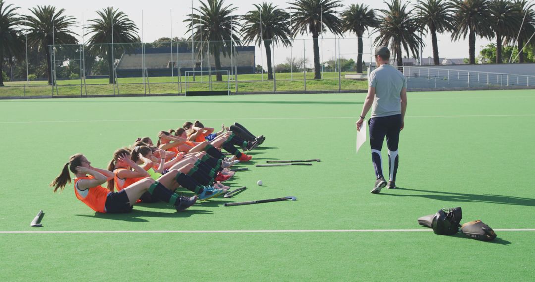 Women's Field Hockey Team Training Warm-ups on Turf Field Outdoors - Free Images, Stock Photos and Pictures on Pikwizard.com