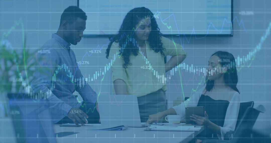 Professional Team Analyzing Financial Chart Data in Modern Office