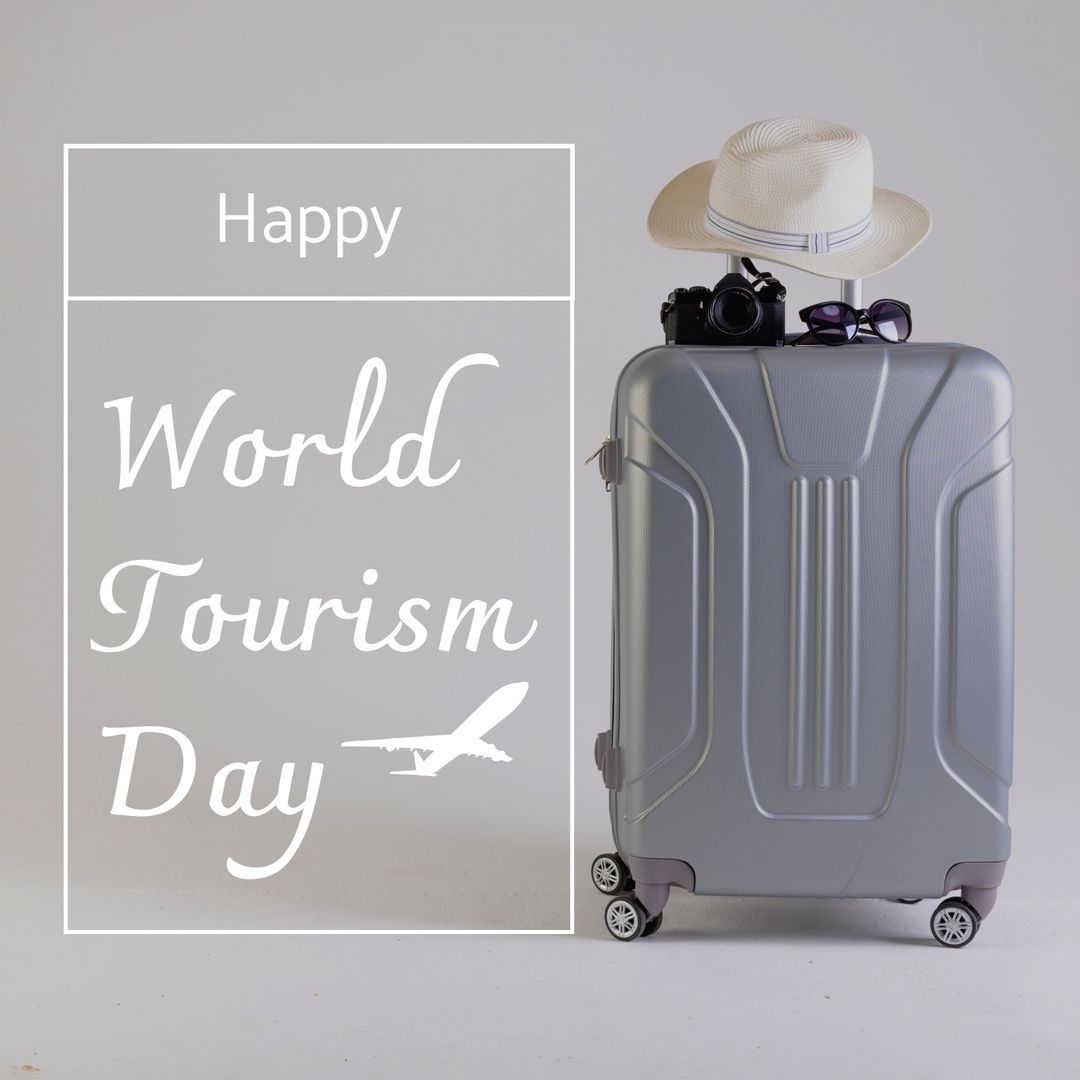 World Tourism Day Celebration with Suitcase and Travel Essentials
