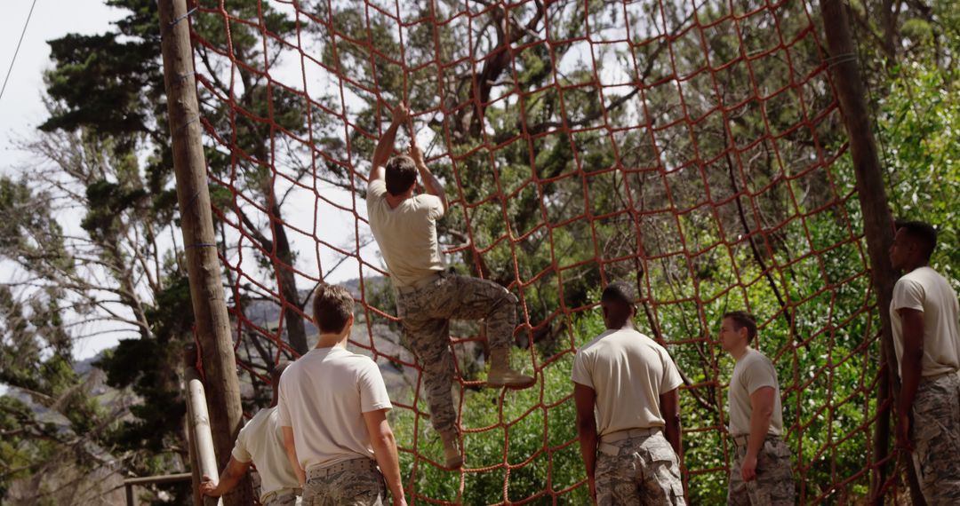 Military Team Navigating Outdoor Obstacle Course
