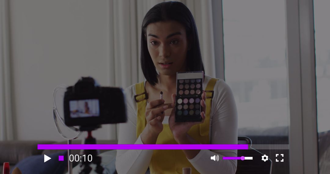 Beauty Influencer Filming Makeup Tutorial at Home