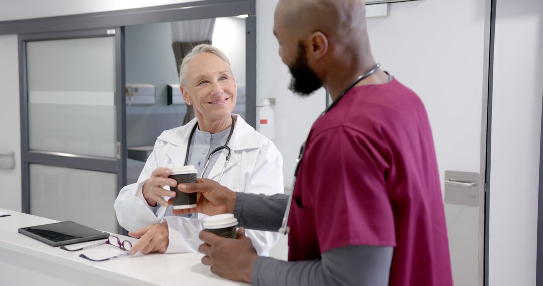 Medical Professionals Having Coffee Break in Hospital - Free Images, Stock Photos and Pictures on Pikwizard.com