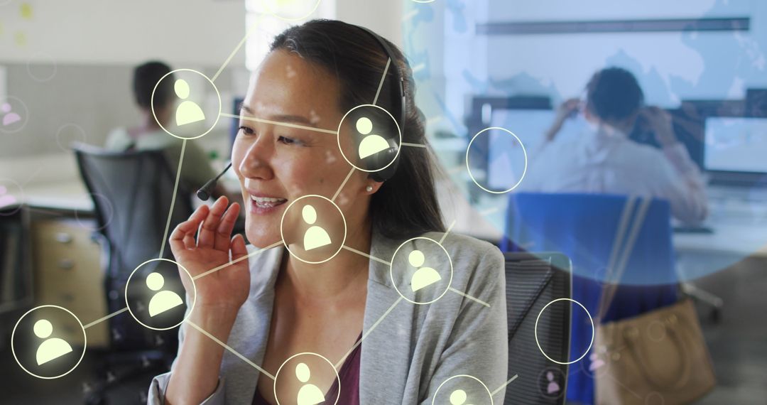Asian Businesswoman Engaging in Global Networking with Phone Headset