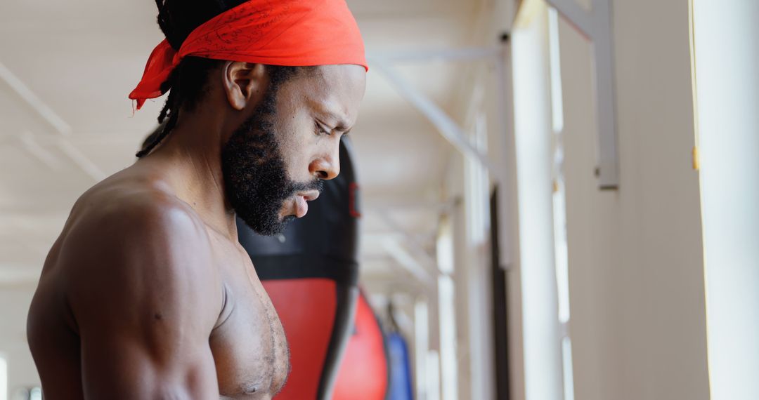 Focused African American Man Exercising in Gym - Free Images, Stock Photos and Pictures on Pikwizard.com