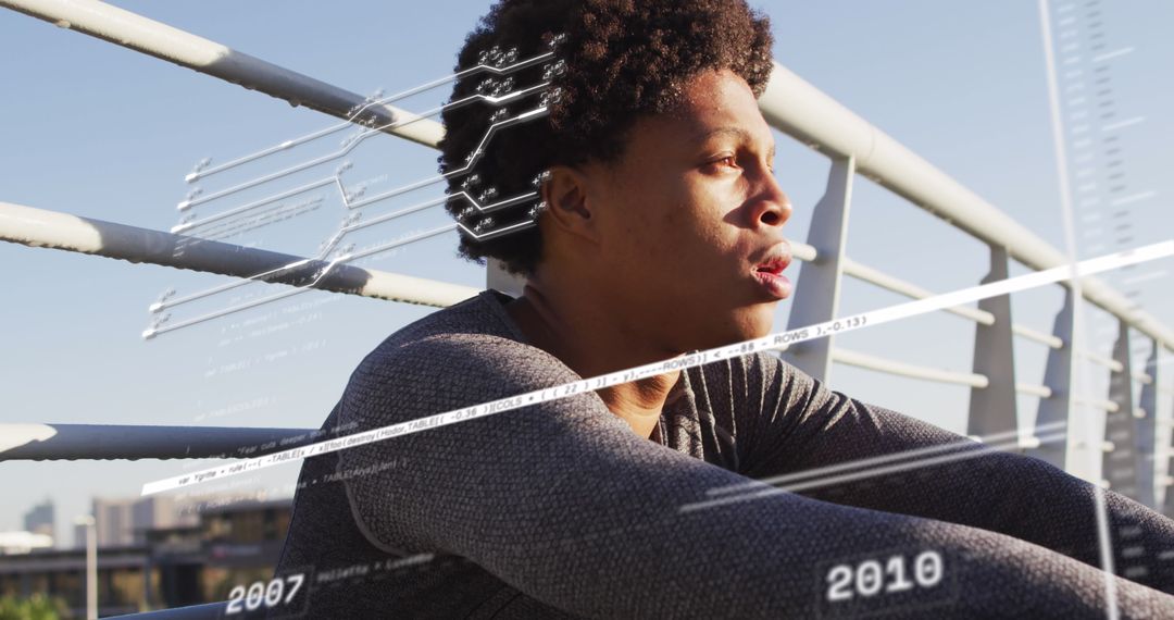 Man Contemplating Future with Digital Data Visualization