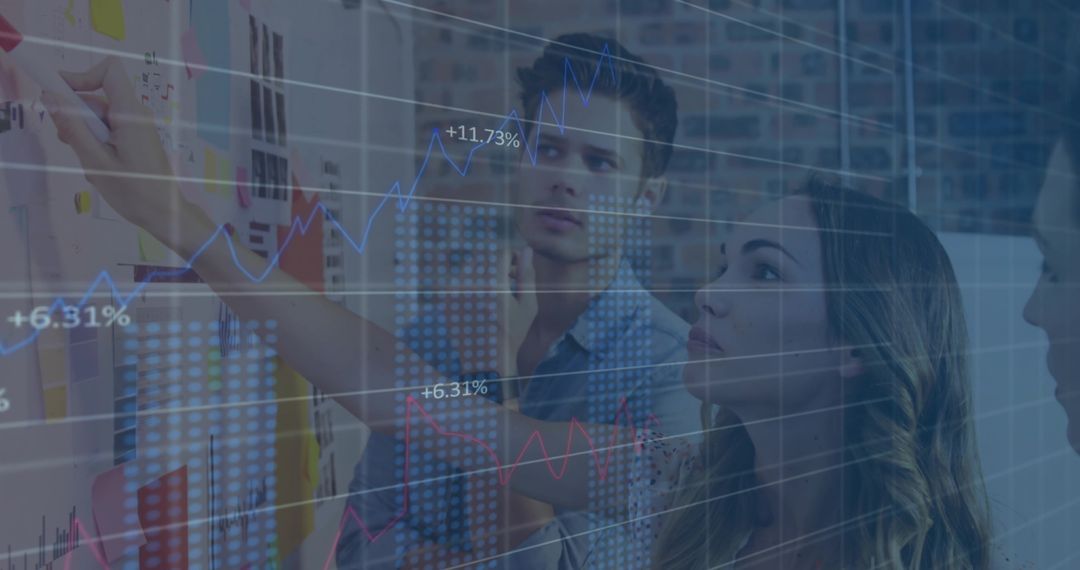 Collaborative Business Team Analyzing Data on Whiteboard with Rising Charts Overlay