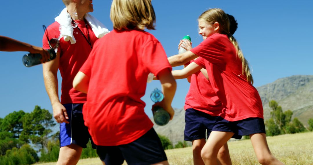 Children Playing Sports Outdoors on Sunny Day - Free Images, Stock Photos and Pictures on Pikwizard.com