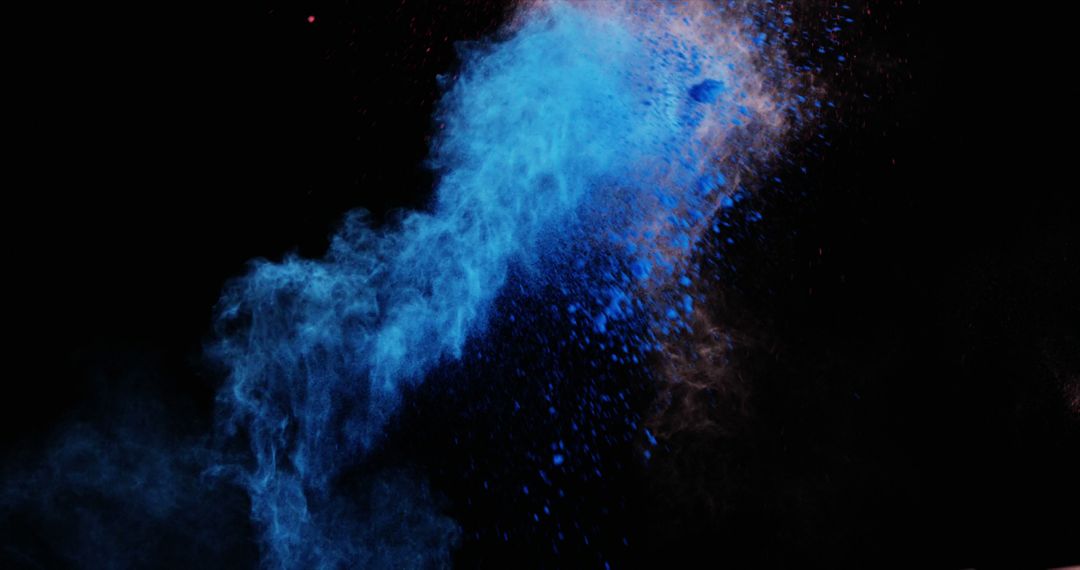 Vibrant Blue Powder Explosion Against Black Background - Free Images, Stock Photos and Pictures on Pikwizard.com
