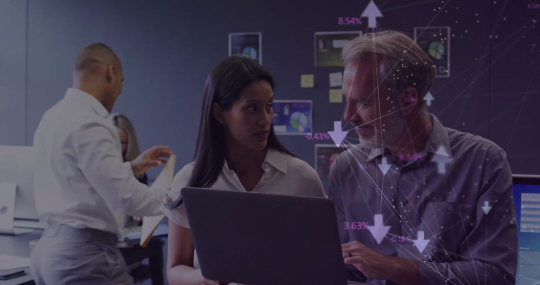 Diverse Business Team Analyzing Global Market Data in Office