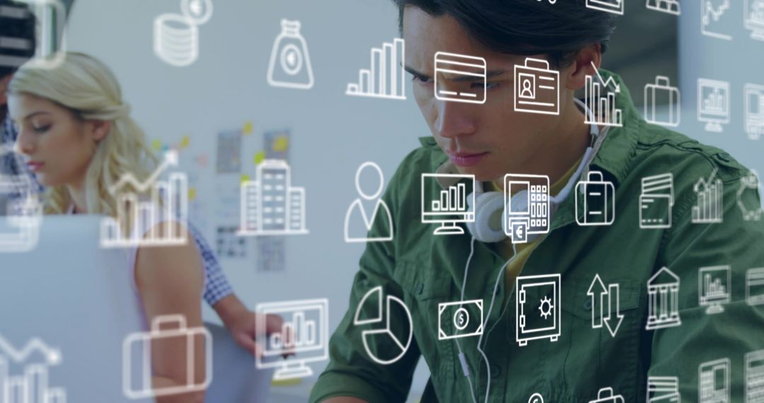 Young professional analyzing data with floating analytics icons in modern coworking space