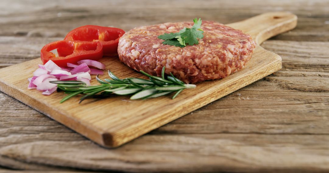 Raw Ground Pork Patty with Vegetables on Wooden Cutting Board - Free Images, Stock Photos and Pictures on Pikwizard.com