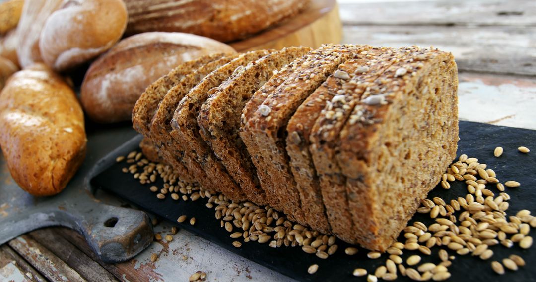 Freshly Baked Whole Grain Bread on Rustic Table - Free Images, Stock Photos and Pictures on Pikwizard.com