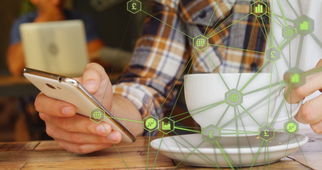 Digital Network Overlay with Man Using Smartphone in Cafe
