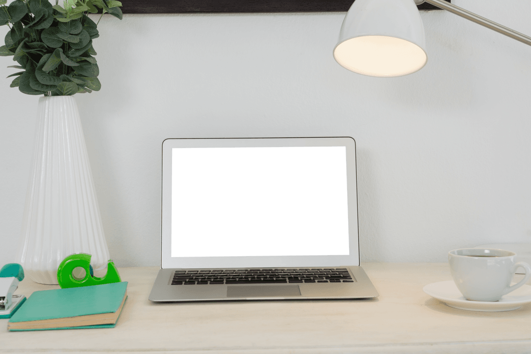 Transparent Screen Laptop on Minimalist Desk with Lamp