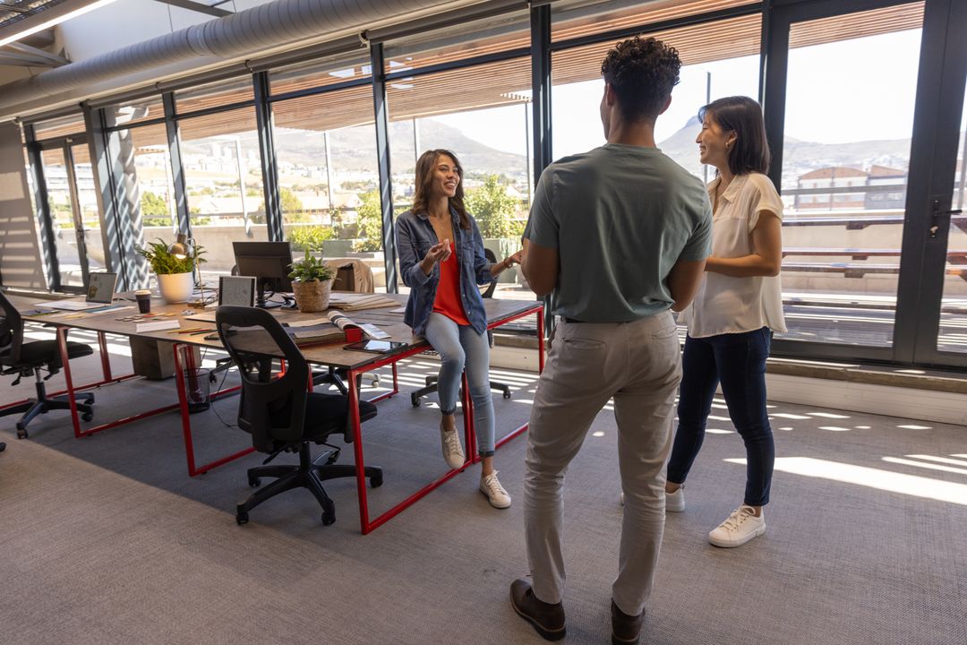 Diverse Coworkers Collaborating in Contemporary Office Space