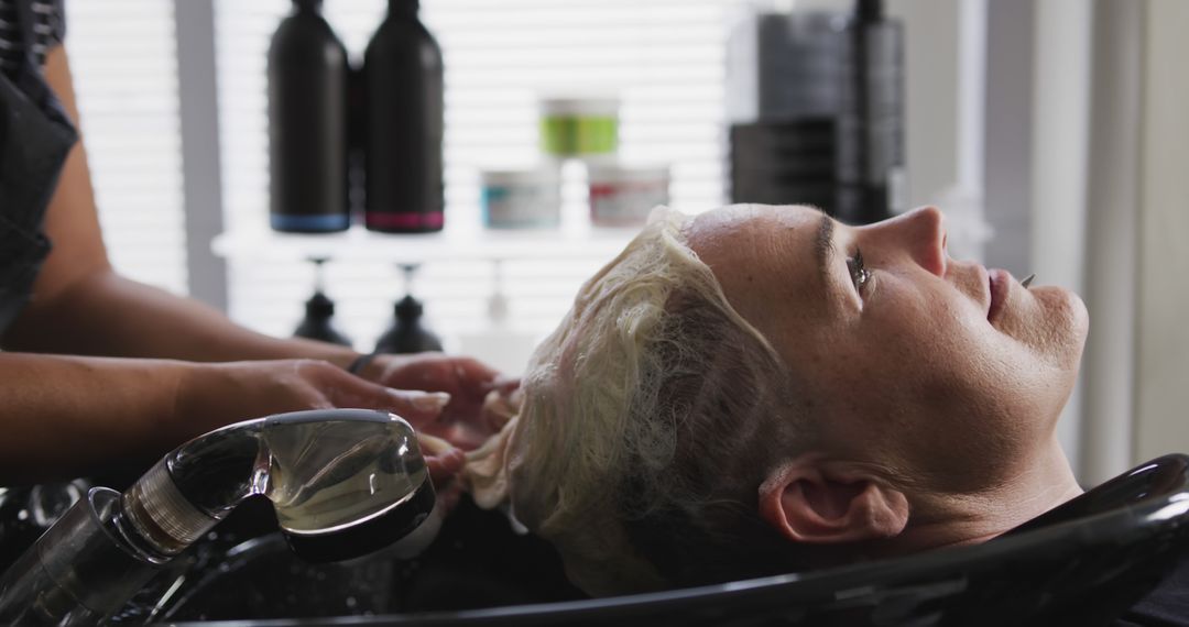 Woman Getting Hair Washed at Salon - Free Images, Stock Photos and Pictures on Pikwizard.com