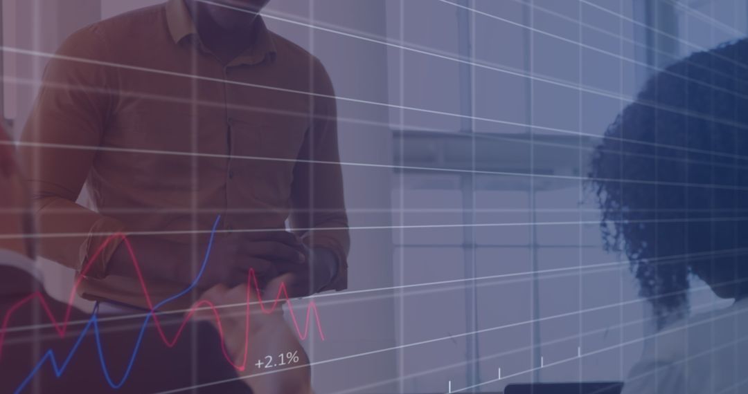 Financial Team Discussing Growth Trends in Modern Office