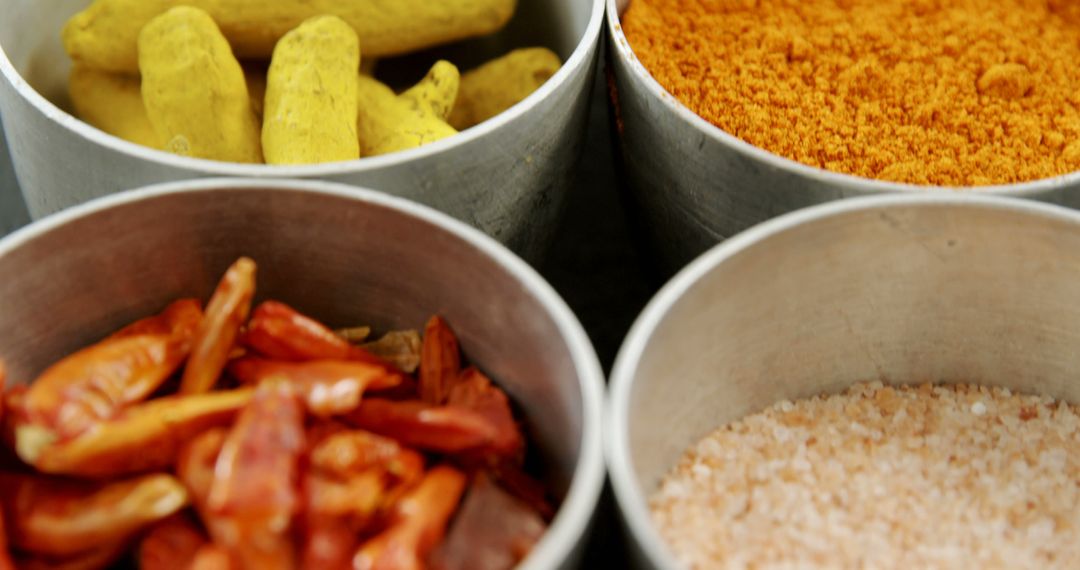 Assorted Spices in Metal Containers Showcasing Culinary Variety - Free Images, Stock Photos and Pictures on Pikwizard.com