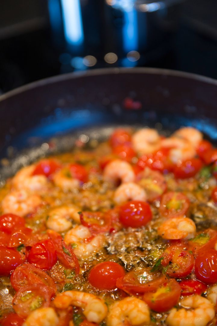 Cooking Shrimp and Cherry Tomatoes in Skillet - Free Images, Stock Photos and Pictures on Pikwizard.com